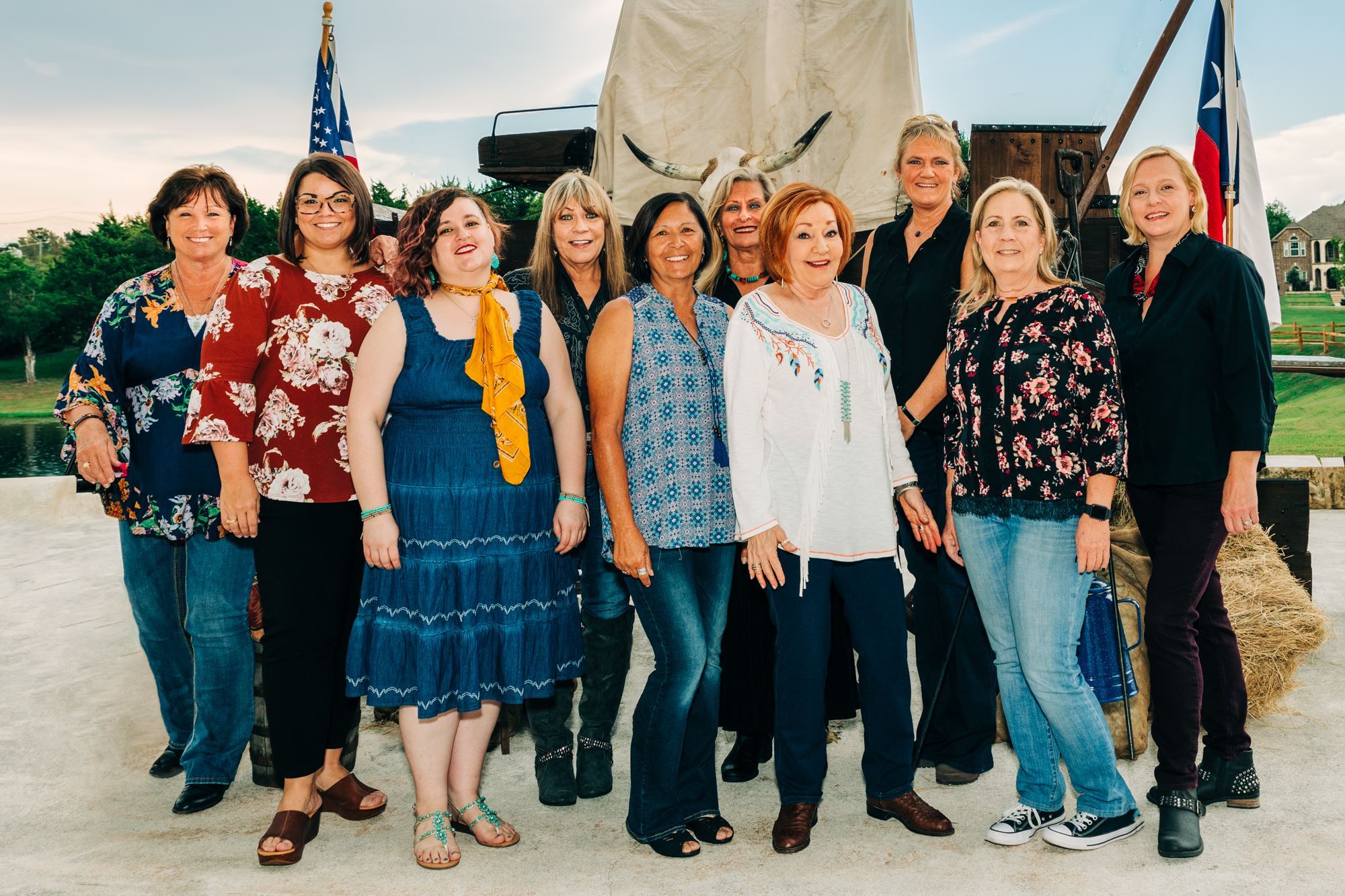 Group of Women Standing Together and Smiling
