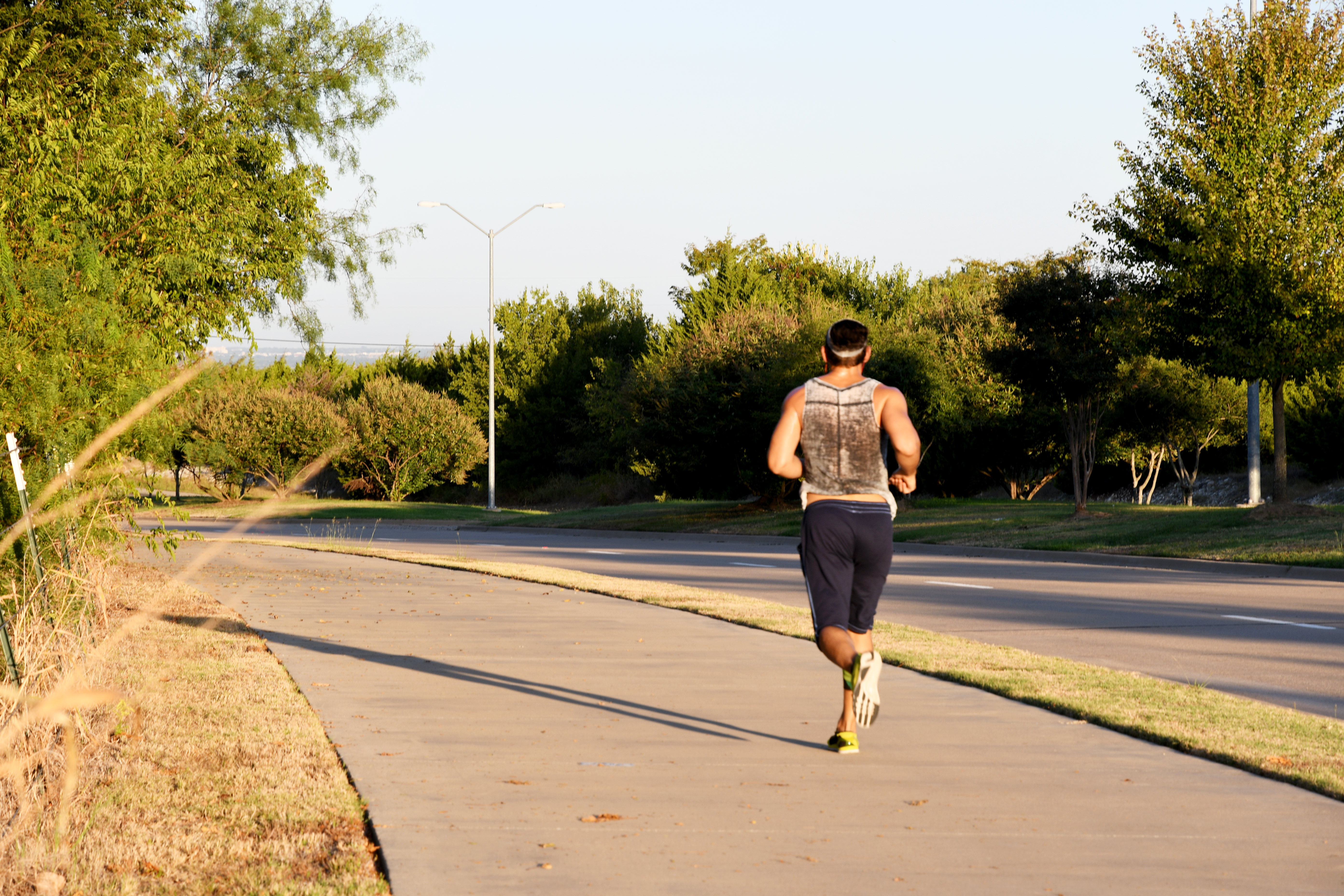 Runner on Lake Ridge Parkway Trail 